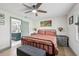 Comfortable bedroom with en-suite bathroom and view of the bath fixtures at 1360 Gladiolas Dr, Winter Park, FL 32792
