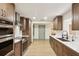 Modern kitchen featuring updated appliances, countertops, and ample cabinet space at 1360 Gladiolas Dr, Winter Park, FL 32792