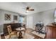 Bedroom area featuring a ceiling fan, wood floors, a writing desk, and a table with chairs at 14377 Lord Barclay Dr, Orlando, FL 32837