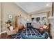 Comfortable living room showcasing hardwood floors, natural light, and stylish decor at 14377 Lord Barclay Dr, Orlando, FL 32837