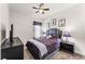Well-lit bedroom with a comfortable-looking bed and contemporary decor, offering a relaxing retreat at 14880 Ellingsworth Ln, Winter Garden, FL 34787