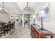 Elegant entryway with tile flooring, decorative lighting, and open views of the home at 14880 Ellingsworth Ln, Winter Garden, FL 34787