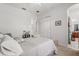 Neutral bedroom featuring a closet and carpeted floors, and modern ceiling fan at 16108 Bristol Lake Cir, Orlando, FL 32828