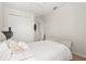 Bright, neutral bedroom with large bed and ample space, ceiling fan and large closet for storage and organization at 16108 Bristol Lake Cir, Orlando, FL 32828