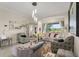 Bright and airy living room with plush seating, large windows, and elegant decor at 16108 Bristol Lake Cir, Orlando, FL 32828