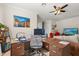 Bright and airy office space, featuring a desk, computer and natural lighting at 16108 Bristol Lake Cir, Orlando, FL 32828