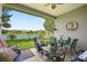 Relaxing patio with a view of the community pond, with lots of comfortable seating for entertaining or relaxing at 16108 Bristol Lake Cir, Orlando, FL 32828
