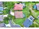 An aerial view shows well manicured lawns and pools behind homes in a neighborhood at 1657 Tennyson Ct, Lake Mary, FL 32746