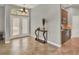 Bright foyer featuring tile floors and an open view of the kitchen, creating a welcoming entry at 1657 Tennyson Ct, Lake Mary, FL 32746