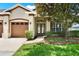 Charming home showcasing a beautifully landscaped front yard, complemented by a welcoming entrance at 1657 Tennyson Ct, Lake Mary, FL 32746