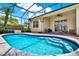Enclosed pool area with clear blue water, an outdoor seating area, and a bright sky at 1657 Tennyson Ct, Lake Mary, FL 32746