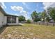 Large fenced backyard, patio slab and covered porch are perfect for outdoor living and entertaining at 1668 Fort Smith Blvd, Deltona, FL 32725