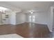 Spacious living room featuring hardwood floors and a ceiling fan at 1668 Fort Smith Blvd, Deltona, FL 32725
