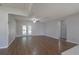 Spacious living room features hardwood floors and access to back yard at 1668 Fort Smith Blvd, Deltona, FL 32725