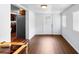 Bright dining area with laminate floors, white walls, and exterior door at 1805 Paloma Ave, Sanford, FL 32771