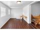 Bright dining area features dark laminate floors and simple decor at 1805 Paloma Ave, Sanford, FL 32771