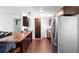 Updated kitchen with stainless steel appliances, granite countertops, and dark cabinetry at 1805 Paloma Ave, Sanford, FL 32771
