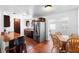 Open kitchen with stainless steel appliances and a center island with barstool seating at 1805 Paloma Ave, Sanford, FL 32771