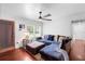 Comfortable living room featuring plush seating, hardwood floors, and ample natural light at 1805 Paloma Ave, Sanford, FL 32771