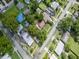 Aerial view of neighborhood featuring many homes and mature trees at 1979 Staunton Ave, Winter Park, FL 32789