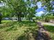 Backyard featuring luscious grass and big mature trees at 1979 Staunton Ave, Winter Park, FL 32789