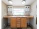 Bathroom featuring double sinks, generous counter space, and plenty of storage at 1979 Staunton Ave, Winter Park, FL 32789
