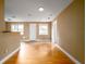 Open-concept living room featuring gleaming floors, neutral walls, and plenty of natural light at 1979 Staunton Ave, Winter Park, FL 32789