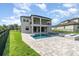 Backyard features a pool, spa, fire pit, and covered lanai at 2060 Panoramic Cir, Apopka, FL 32703