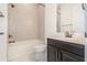 Cozy bathroom featuring a shower-tub combo, modern vanity, and neutral color palette at 2060 Panoramic Cir, Apopka, FL 32703