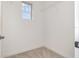 Walk-in closet with standard wire shelving and a small window at 2060 Panoramic Cir, Apopka, FL 32703