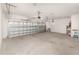 Three car garage offering plenty of parking and storage at 2060 Panoramic Cir, Apopka, FL 32703