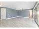 Expansive living room featuring modern ceiling fan, recessed lighting, and stylish flooring at 2060 Panoramic Cir, Apopka, FL 32703