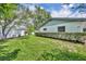 Well-maintained backyard with green grass and a white fence at 2081 Mohican Trl, Maitland, FL 32751