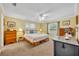 Sunny bedroom features a ceiling fan, natural light, and neutral decor creating a relaxing retreat at 2081 Mohican Trl, Maitland, FL 32751