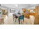 Bright dining room boasts tile floors, built-in shelves, and seamless access to the adjacent kitchen at 2081 Mohican Trl, Maitland, FL 32751