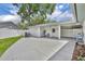 Spacious outdoor patio area with ample seating and a well-maintained lawn at 2081 Mohican Trl, Maitland, FL 32751