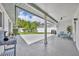 Covered patio featuring outdoor seating and backyard views at 2081 Mohican Trl, Maitland, FL 32751