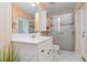 Bathroom with a white sink vanity, tiled flooring, and a glass-enclosed shower at 2135 Springwater Ln, Port Orange, FL 32128