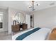 Cozy bedroom with modern furnishings and a large mirror that accentuates the space at 2241 Southbury Dr, Kissimmee, FL 34744