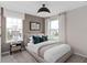 Comfortable bedroom with neutral tones, a large window, and stylish furnishings at 2241 Southbury Dr, Kissimmee, FL 34744