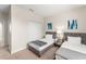 Cozy bedroom featuring two twin beds, neutral walls, and mirrored nightstand at 235 Aidans Lndg, Haines City, FL 33844