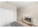 Bedroom featuring a mirrored dresser, large closet, and neutral color palette at 235 Aidans Lndg, Haines City, FL 33844