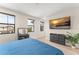 Bright bedroom featuring 3 large windows and a modern dresser at 235 Aidans Lndg, Haines City, FL 33844