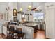 Well-appointed kitchen featuring granite countertops, custom cabinets, and a central island at 291 River Rd, Oak Hill, FL 32759