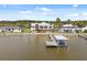 Stunning waterfront home with a private dock and boat lift, perfect for enjoying waterfront living at 291 River Rd, Oak Hill, FL 32759