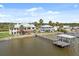 This waterfront home offers a private dock and stunning river views at 291 River Rd, Oak Hill, FL 32759
