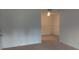 Neutral living room with a carpeted floor and white walls at 315 Wymore Rd # 104, Altamonte Springs, FL 32714