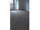 Living room offering sliding doors to a private balcony at 315 Wymore Rd # 104, Altamonte Springs, FL 32714