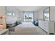 Relaxing bedroom featuring a comfortable bed, blue accents, and a view of the outdoors at 3346 Wakefield Dr, Haines City, FL 33844