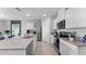 Modern kitchen featuring a center island, stainless appliances, and white cabinetry at 3346 Wakefield Dr, Haines City, FL 33844